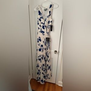 Lulus floor length blue and white floral wrap dress.